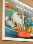 Photo of the white satin poster paper finished product on display